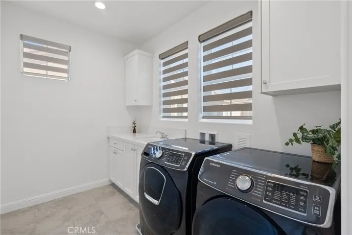 Laundry Room equipped with Washer & Dryer
