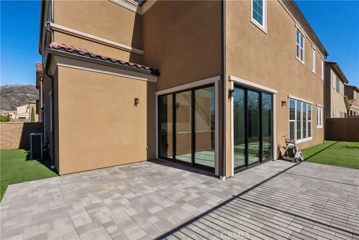 Maintenance free Backyard with Hardscape and Turf