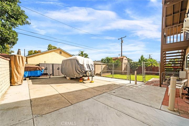 Spacious Parking with Room for Multiple Cars or RV Parking