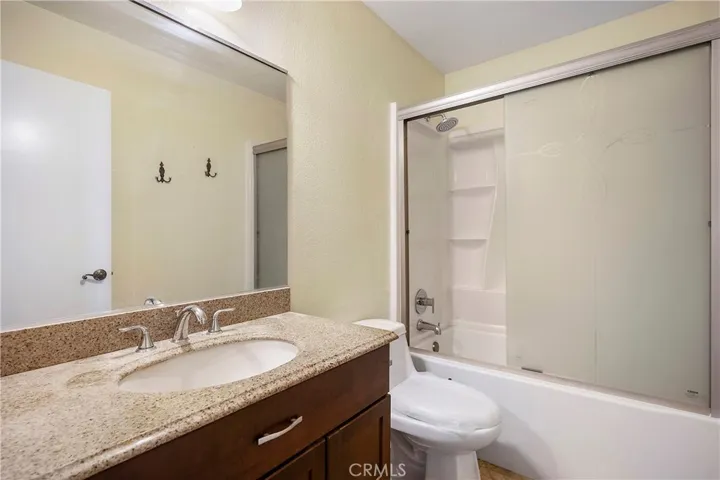 Bathroom in hallway. New tub, new toilet, new faucets
