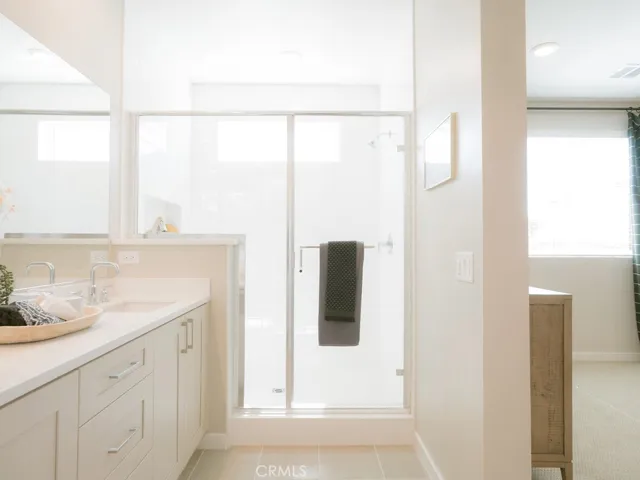 Model Primary Bathroom with large walk in shower.