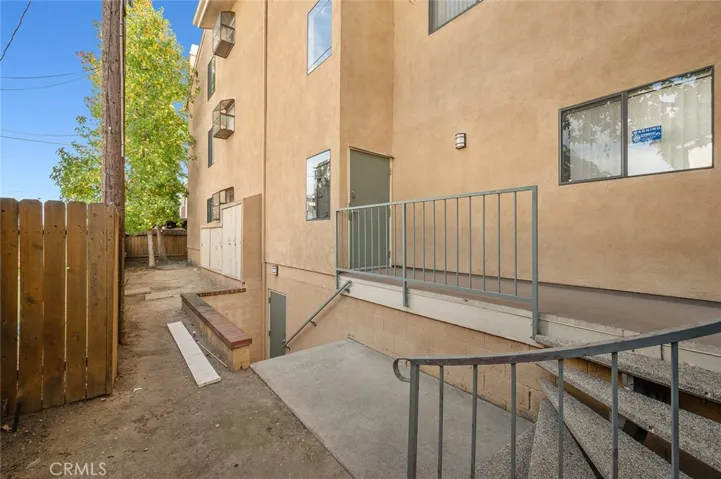 Private and enclosed dog run area in the back of the building