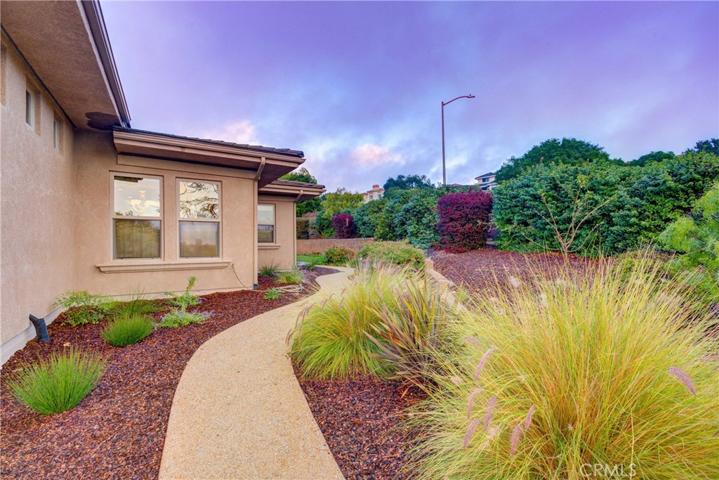 Relax in this beautifully landscaped backyard