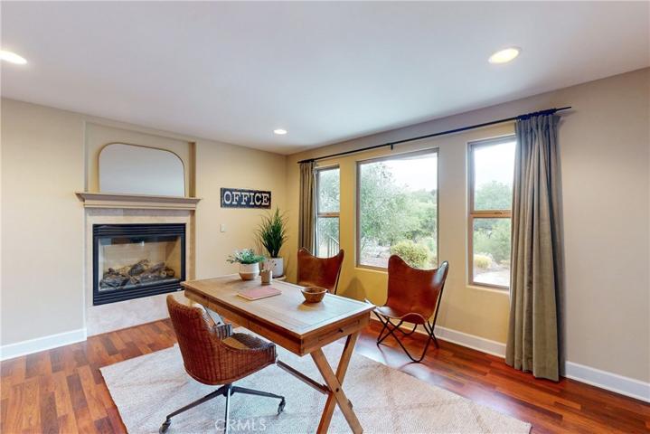 Filled with Natural Light and the Comfort of a Warming Fireplace