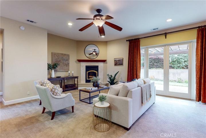 Family room with woodburning fireplace