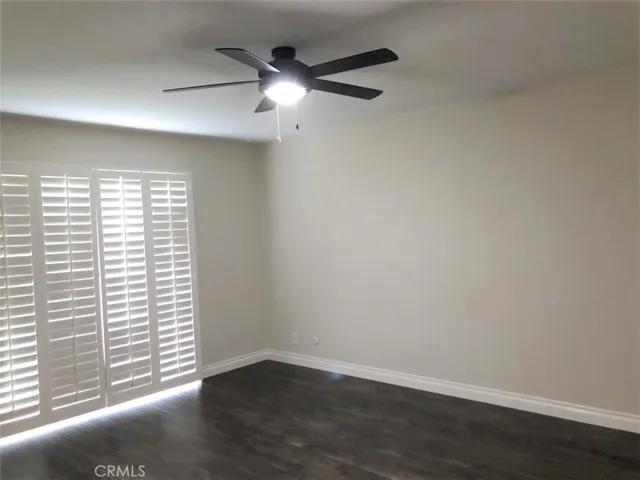 Master Bedroom w/ sliders to yard