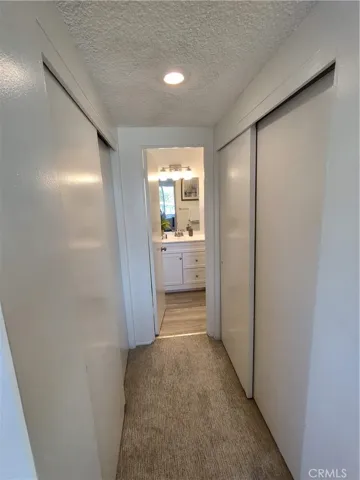 Dual closets with separate bathroom entrance