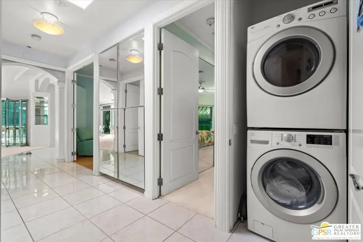 Bedroom Hallway with Laundry Closet