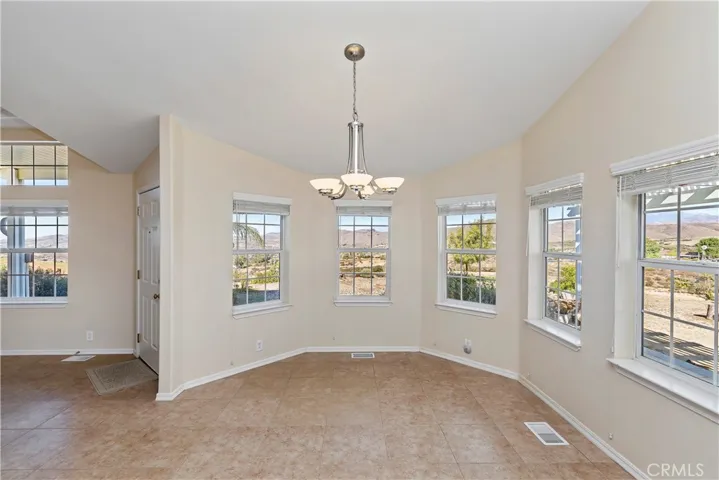 MAIN HOUSE DINING ROOM OPEN FLOOR PLAN TO FAMILY ROOM & KITCHEN