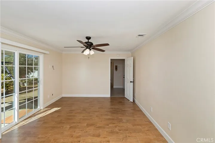 GUEST QUARTERS PRIMARY BEDROOM WITH FRENCH SLIDER TO PRIVATE PATIO