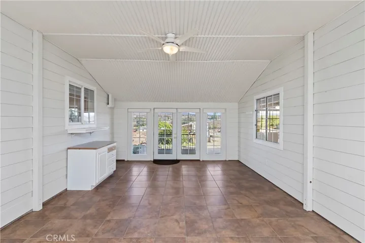 MAIN HOUSE ENCLOSED BREEZEWAY BETWEEN GUEST QUARTERS AND MAIN HOUSE