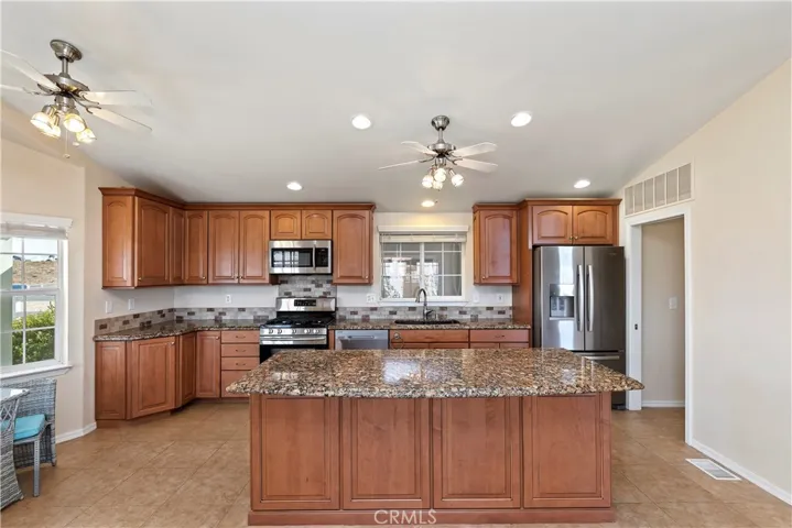 MAIN HOUSE KITCHEN WITH ISLAND/BAR