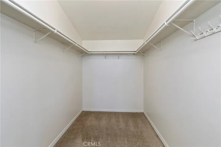 MAIN HOUSE PRIMARY BEDROOM LARGE WALK-IN CLOSET