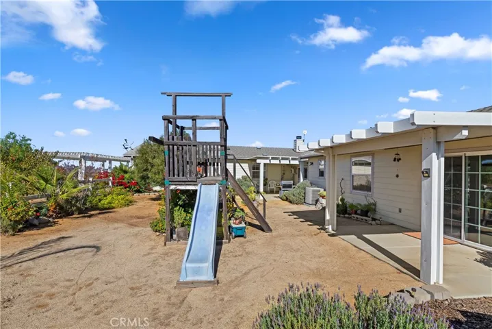 FENCED IN BACK YARD AREA.  GREAT FOR KIDS OR PETS