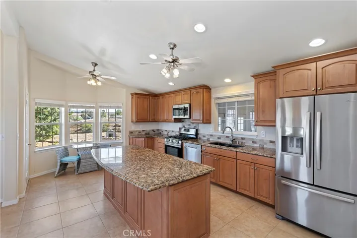 MAIN HOUSE KITCHEN BREAKFAST AREA. FRIDGE INCLUDED