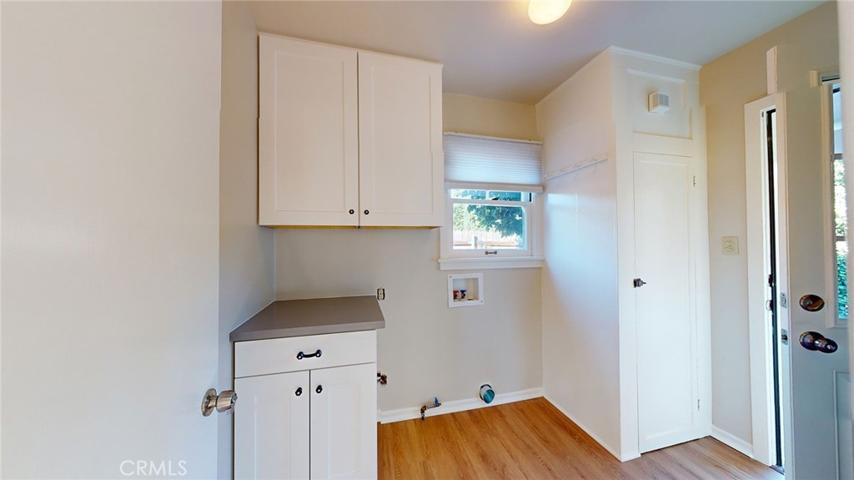 Laundry Room / Service Porch- Leads to Kitchen, backyard and basement