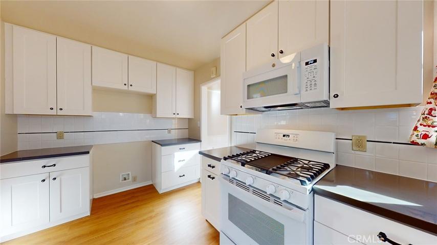Kitchen - New Cabinets, Counters, Tile, Flooring, Stove, Microwave & Dishwasher