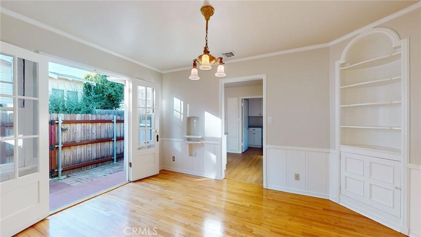 Dining Room with beautiful built-ins and private yard space