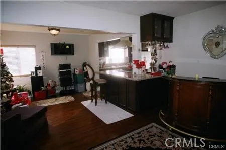 living room opens to kitchen