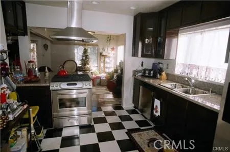 gourmet kitchen with cherry cabinets