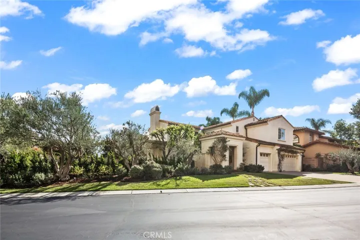 Very private and peaceful location with entrance pavilion and 3 car garage.