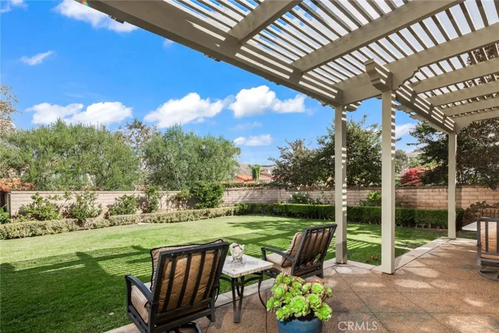Bach yard is large enough space for pool or pickle ball court.