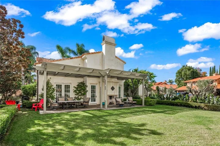 Large outdoor eating area. Table and chairs are included in sale. Doors on left open to dining room. On right to living room.