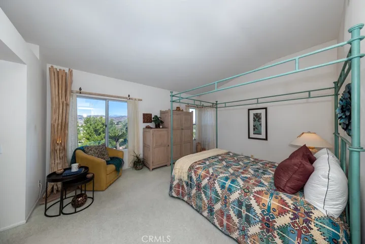 Primary room with double door entry.