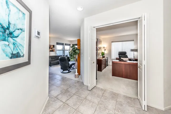 Entering the downstairs office or bedroom.