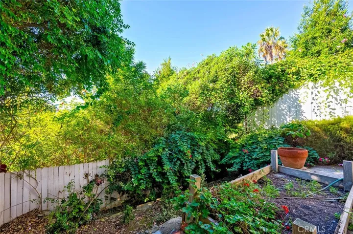 Lush, private front yard.