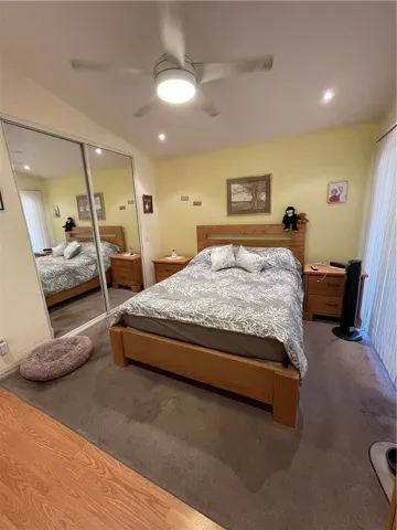 Primary Bedroom with ample room and a large mirrored closet doors. The closet is deep and wide!