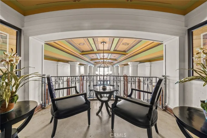 Elegant balcony overlooking the Grand Lobby - perfect spot to wait for your take out to arrive