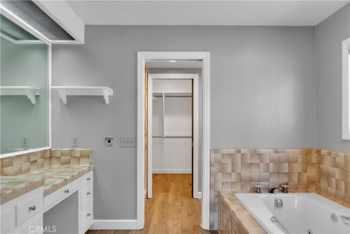 Primary Bathroom separate tub/shower and walk in closet