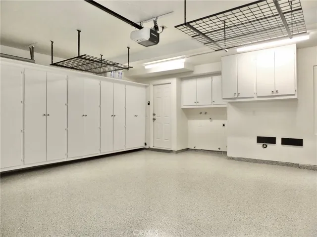 Built-in cabinets, laundry equipment space & access door to kitchen