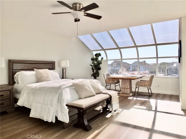 Dramatic contemporary window in primary bedroom