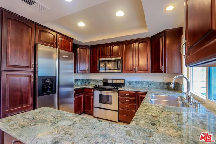 Kitchen with view of Enclosed Patio
