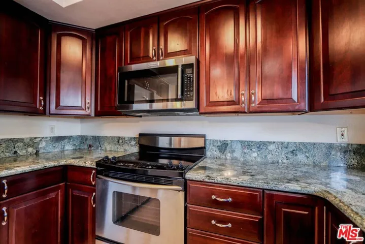 Kitchen with view of Enclosed Patio