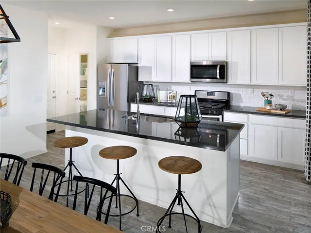 Photo is not of the actual home, but is an inspirational photo of builder’s model home and may depict options, furnishings, and/or decorator features that are not included