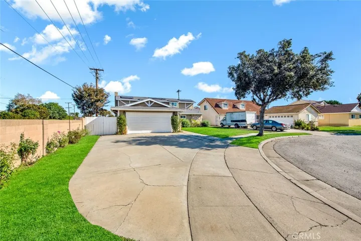 Home is Located at the End of a Cul-deSac on an Oversized 7410 SQFT Lot with a Tropical Oasis Resort-Style Backyard with Pool/Spa!