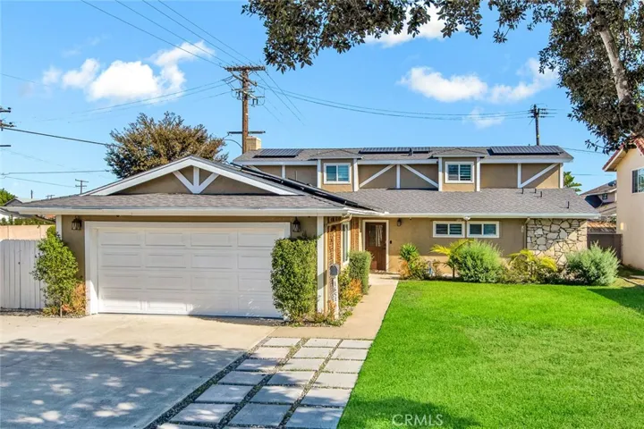 Absolutely Stunning Beautifully Remolded and Resigned 5 Bedroom, 3 Bath (2 Primary Suits - 1 Up/1Down) 2165 SQFT Home.