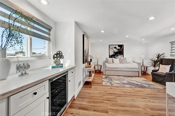 One of the Bedroom Upstairs Includes a Quartz Kitchenette Counter & Cabinetry with Built-In Wine Cooler.