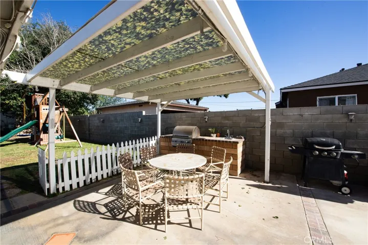 Enjoy cooking outside with the built-in barbecue and sink.