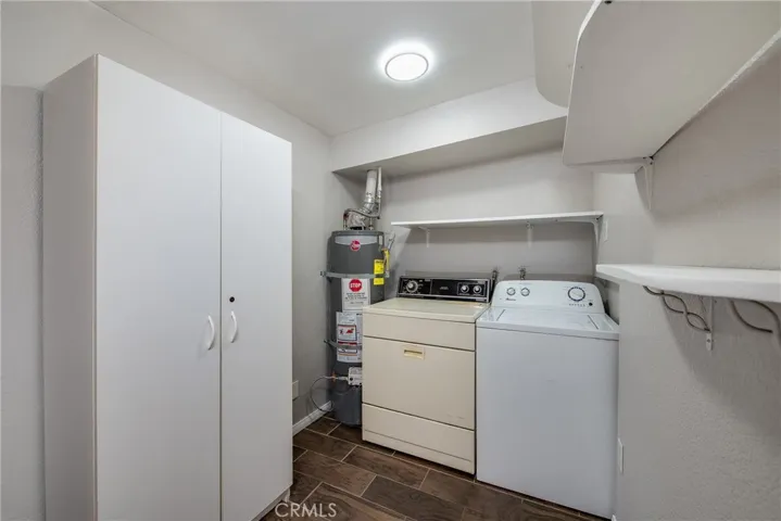 There is plenty of storage in the laundry room.