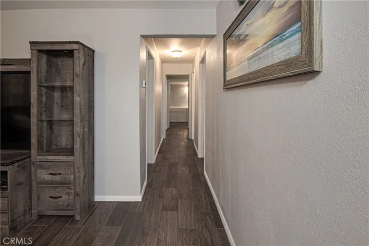 The hallway leads you into the rest of the home.