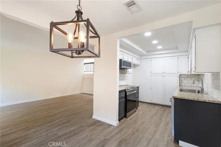 Dining area looking into kitchen