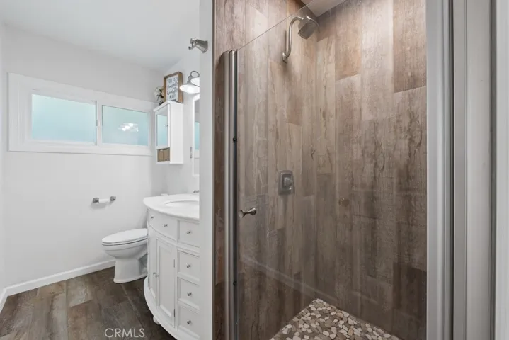 Updated primary bath with gorgeous step in shower