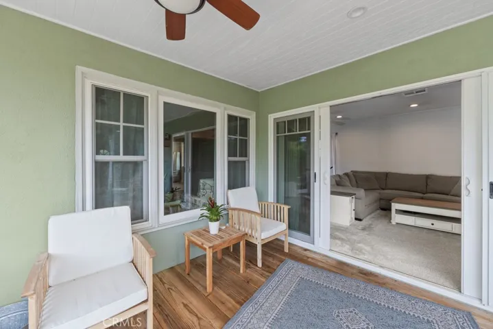 Extend your living space from family room onto covered deck area