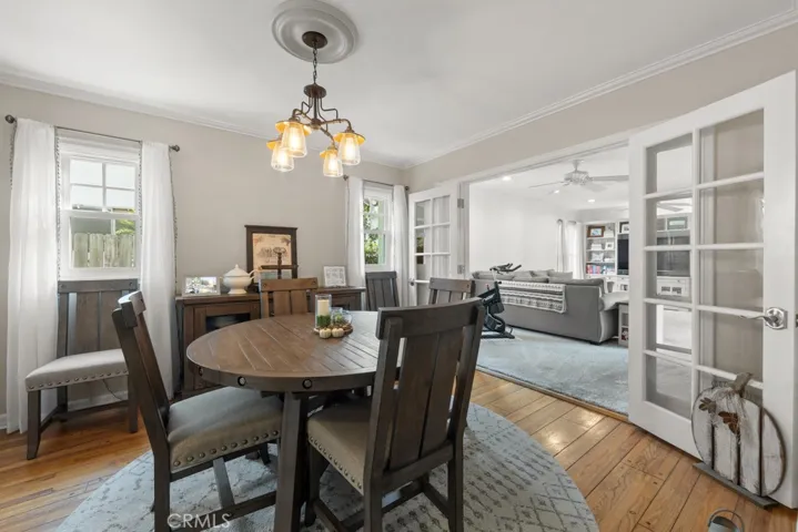 Formal dining with french doors to expansive family room
