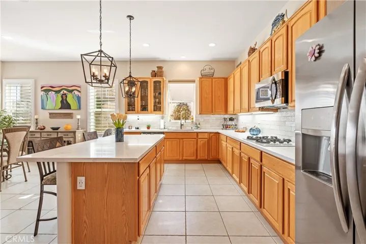 Double-Oven, Built-in Microwave, 4-Burner Gas Cooktop & Stainless Steel Refrigerator