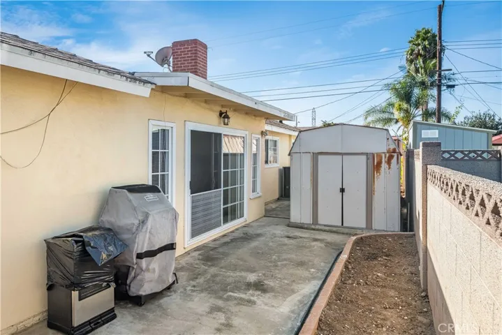 Side yard with storage shed